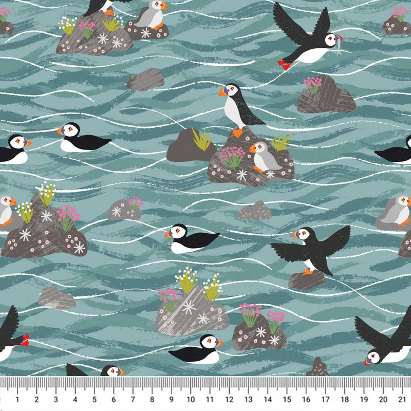 Puffins on rocks printed on a cotton quilting fabric by Lewis & Irene
