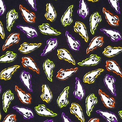 Vibrantly coloured flying ghosts are printed on a black polycotton fabric