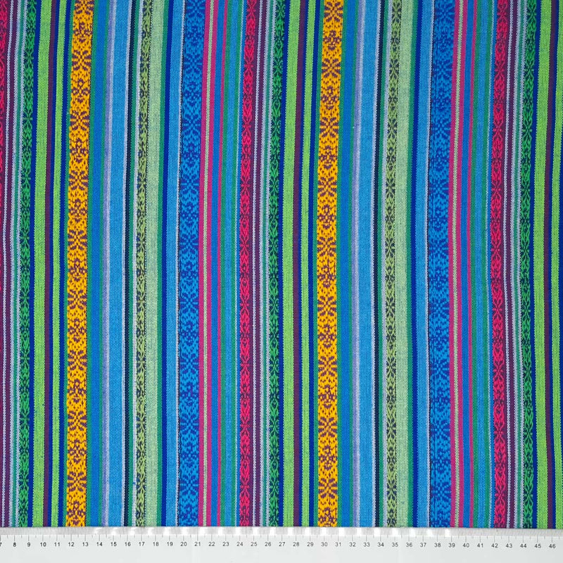 A mexico stripe design in cobolt blue printed on a woven fabric with a cm ruler