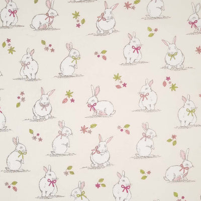 Cute bunnies printed on a cream cotton fabric