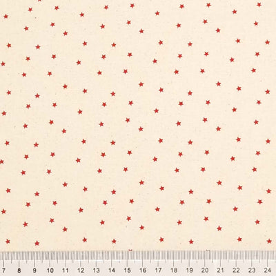 Mini red scattered stars printed on a natural 100% cotton fabric with a cm ruler