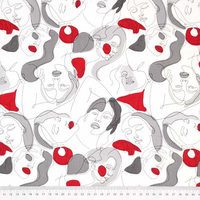 Line drawn faces with splashes of deep red and greys are printed on an ivory viscose fabric with a cm ruler