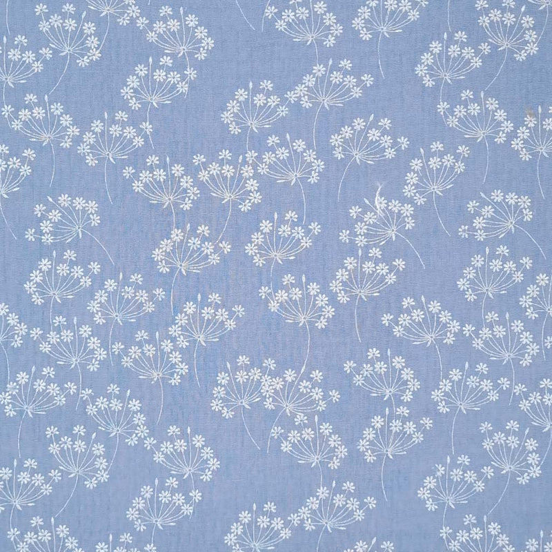 Beige mini bouquets printed on a pale blue double gauze fabric