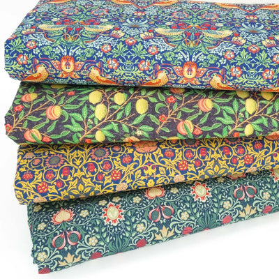 A fat quarter bundle of 4 William Morris printed cotton percale fabrics