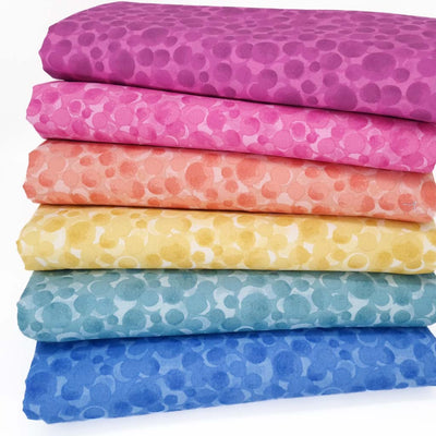A fat quarter bundle of 6 bumbleberry fabrics in rainbow colours