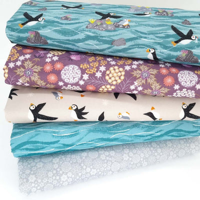 A fat quarter bundle of five puffin and coastal themed designs by Lewis & Irene
