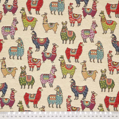 Colourful llamas printed on a new tapestry fabric with a cm ruler