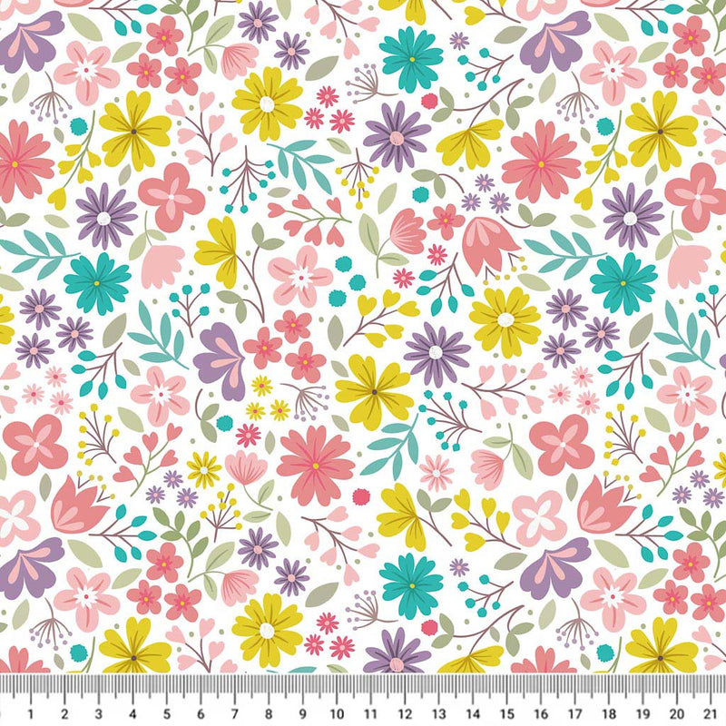A spring time floral design printed on a cream 100% cotton with a cm ruler