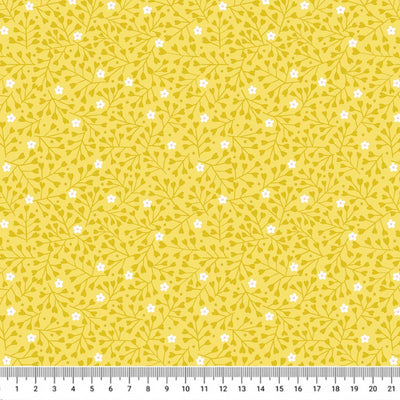 A ditsy floral and heart design printed on a yellow 100% premium quilting cotton with a cm ruler