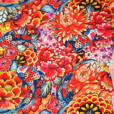 A vibrant oriental scene with flowers and koi carp is printed on a viscose fabric