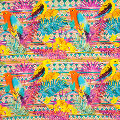 Parakeets are printed on a bright tropical viscose fabric