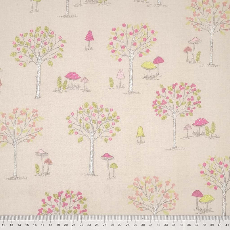 Trees and toadstools printed on a taupe cotton fabric with a cm ruler