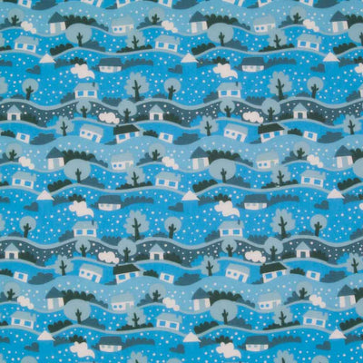A scene from a snow globe printed on a bright blue polycotton fabric.
