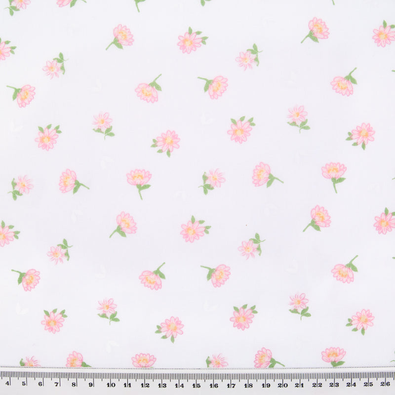 Delicate pink daisies printed on a polycotton floral fabric