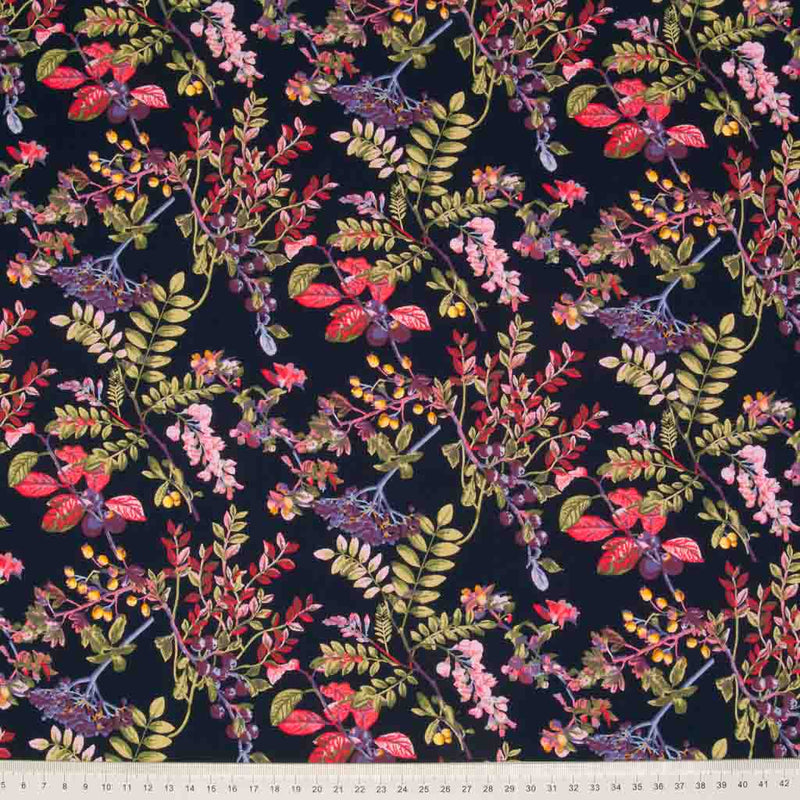 A large floral design featuring wild elderberries on a navy, 100% cotton poplin fabric by Rose & Hubble with a cm ruler at the bottom