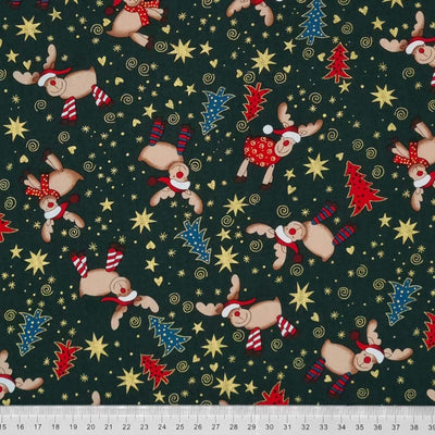 Cute , smiling reindeer wearing colourful scarves and santa hats and metallic stars and hearts are printed on this festive green, cotton fabric by Rose & Hubble with a cm ruler
