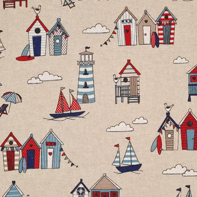 Nautical coloured beach huts are printed on a craft canvas fabric
