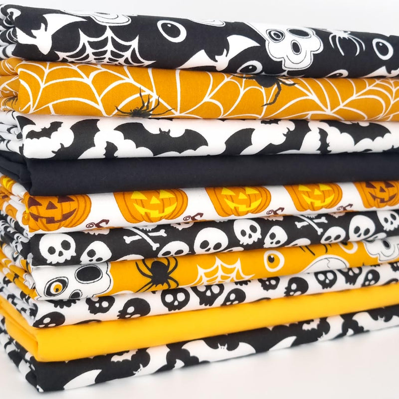 A bundle of ten halloween polycotton fat quarters in black and orange coloursways