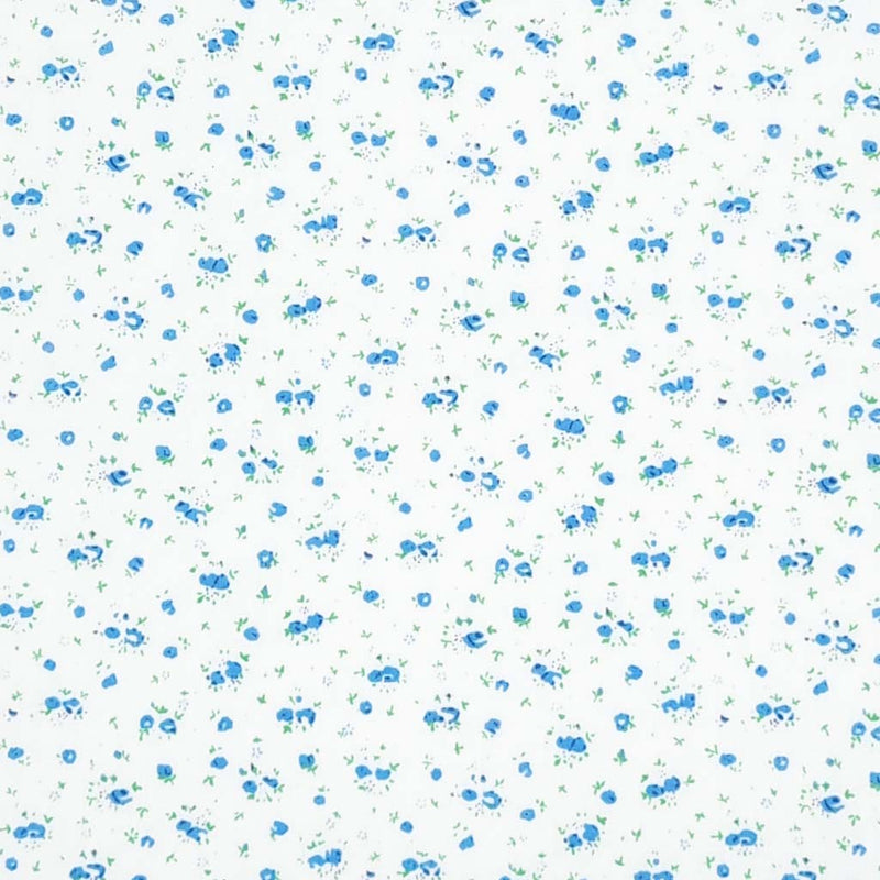A ditsy blue rose bud fabric print on polycotton