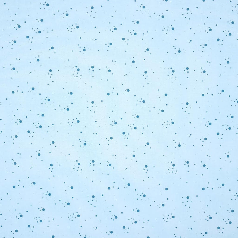 Teal speckled spots printed on a sky blue, 100% cotton fabric