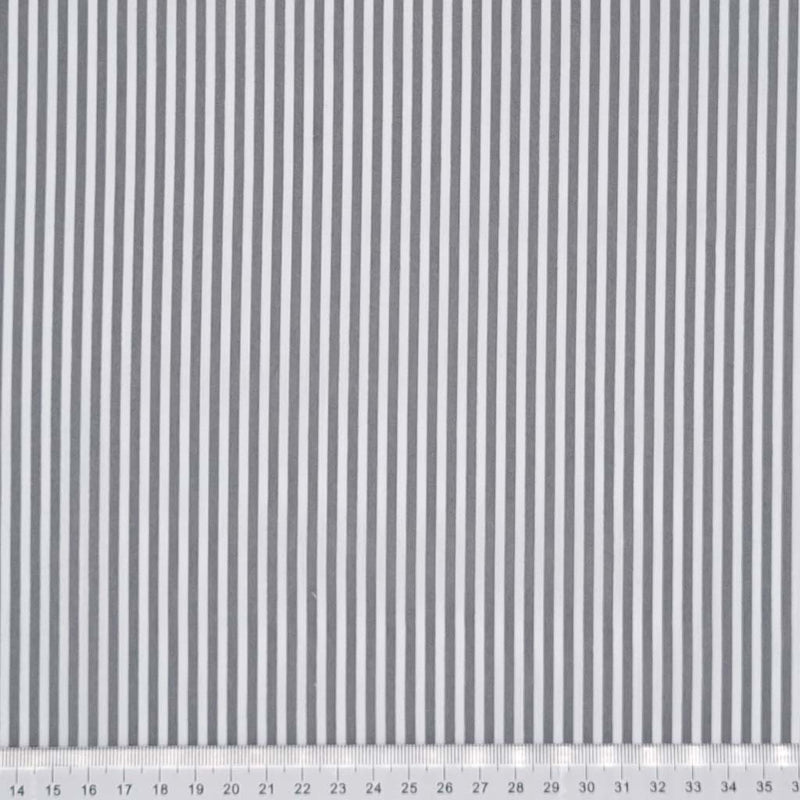 A polycotton printed with grey and white 3mm candy stripe with a cm ruler at the bottom