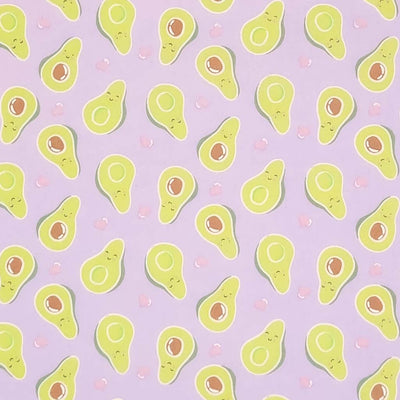 Smiling avocados are printed on a quality lilac polycotton fabric