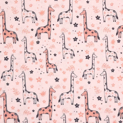 A beautiful giraffe design, printed on a soft brushed polycotton winceyette in light pink.