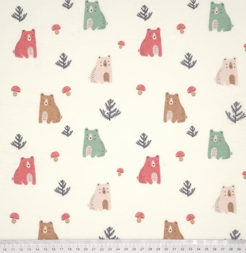 A cute forest bear design, printed on a soft brushed polycotton winceyette in cream with a cm ruler at the bottom