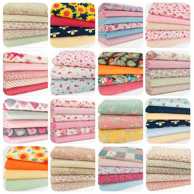Sixteen fat quarter bundles, each with four or five fabrics in pink, blue, green and red