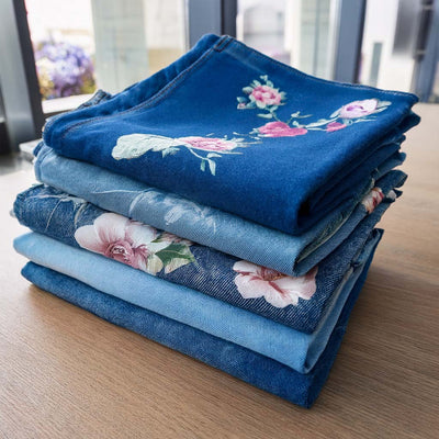 A pile of denim chambray fabrics