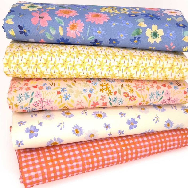 A fat quarter bundle of 5 floral quilting fabrics