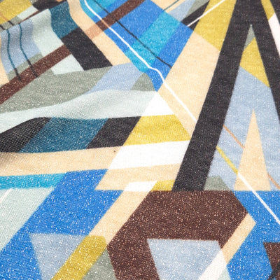 Abstract argyle print in blue with glitter on a stretch fabric