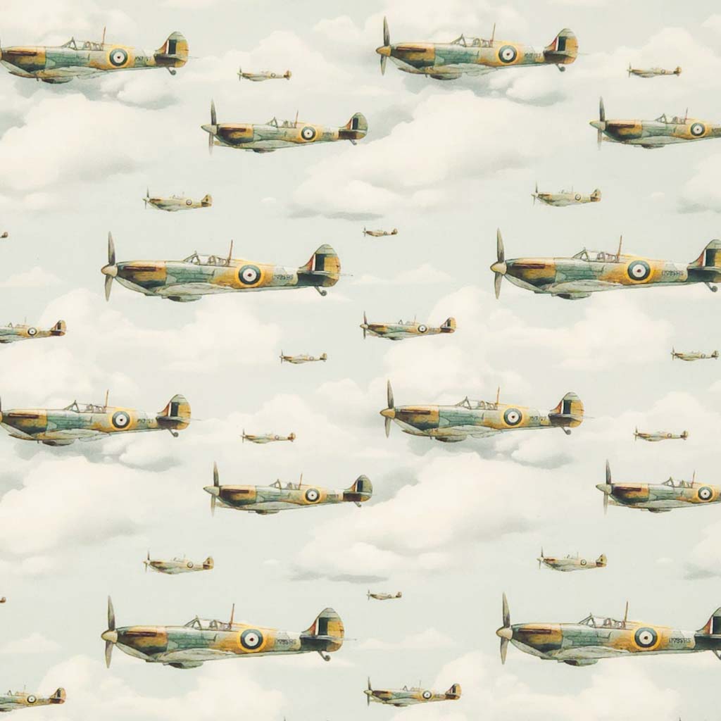 Pattern of vintage airplanes flying through clouds on a light blue cotton poplin fabric
