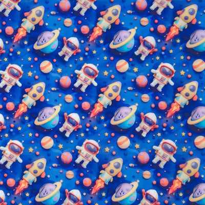 Pattern of space-theme including astronauts, rockets, and planets on a blue polycotton fabric.
