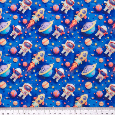 Space-themed pattern including astronauts, rockets, and planets on a blue polycotton fabric.
