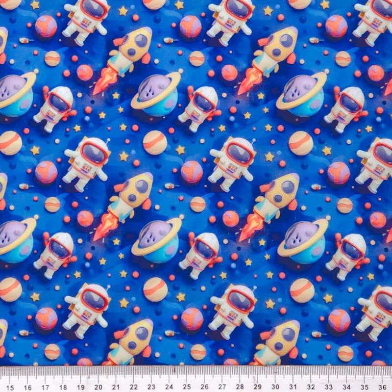 Space-themed pattern including astronauts, rockets, and planets on a blue polycotton fabric.