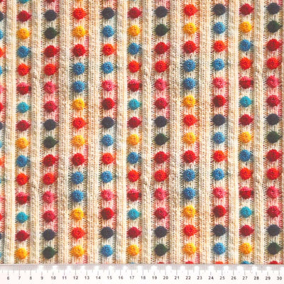 3D colourful bobbles on  a wool rib, printed on a cotton fabric with a cm ruler