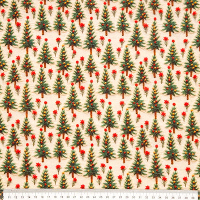 3D christmas trees printed on a cream cotton fabric with a cm ruler