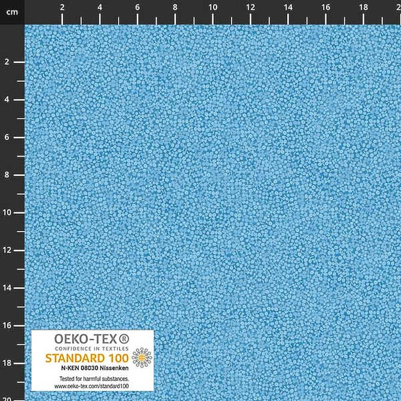 Stof Brighton cotton blender quilting fabric in air blue with a ruler