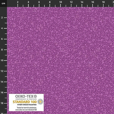 Stof Brighton cotton blender quilting fabric in violet with a ruler