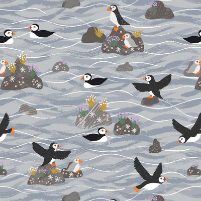 Puffins on rocks printed on a heather grey, cotton quilting fabric
