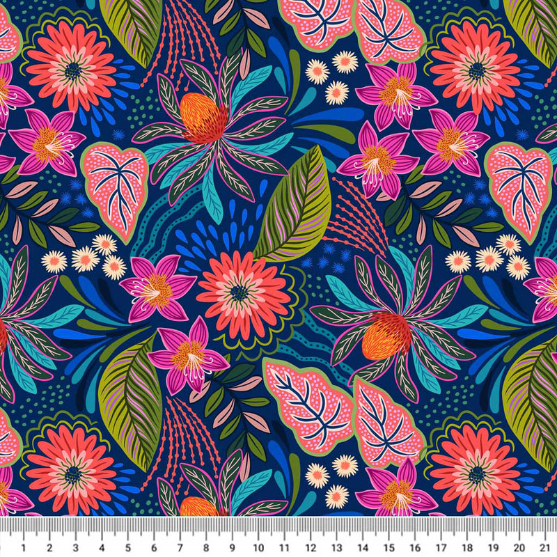 Bright magenta and orange florals printed on a blue quilting fabric with a cm ruler