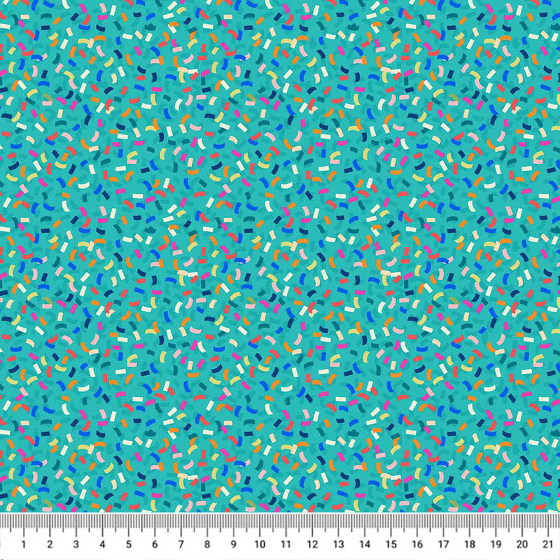 Colourful carnival confetti is printed on a turquoise quilting fabric by Lewis & Irene with a cm ruler