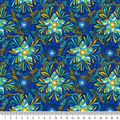 Blue and green star flowers are printed on a dark blue background with a cm ruler