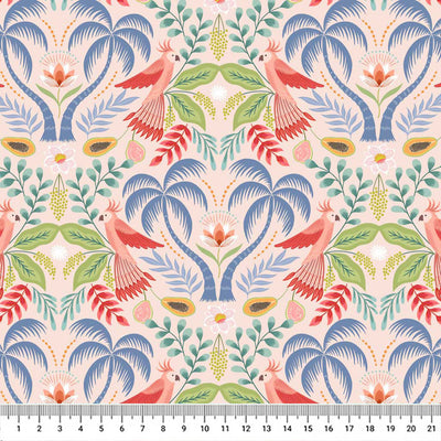 Tropical trees, birds and fruits of paradise are printed on peaceful pink quilting cotton.
