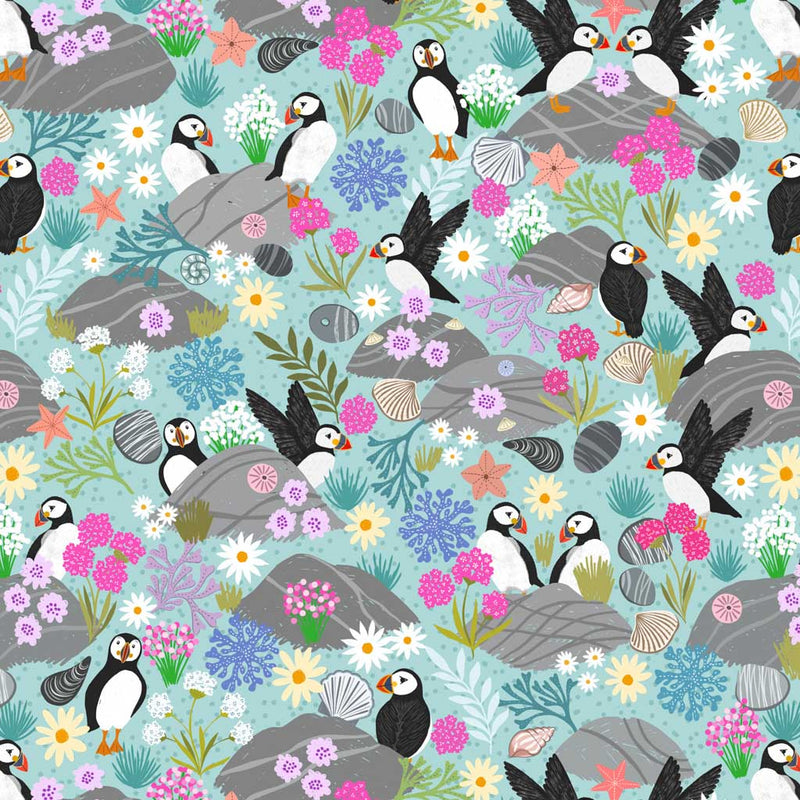 Puffins on sea blue quilting fabric