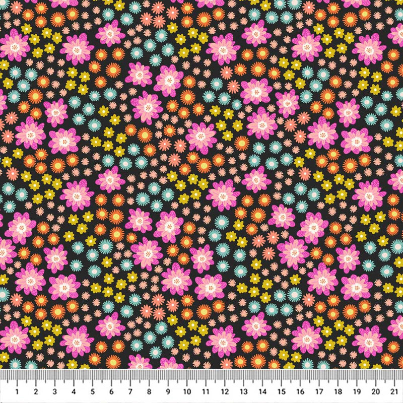 Flowers printed on a black quilting cotton with a cm ruler