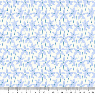 Hand-printed cornflower blue summer daisies printed on a white quilting fabric with a cm ruler