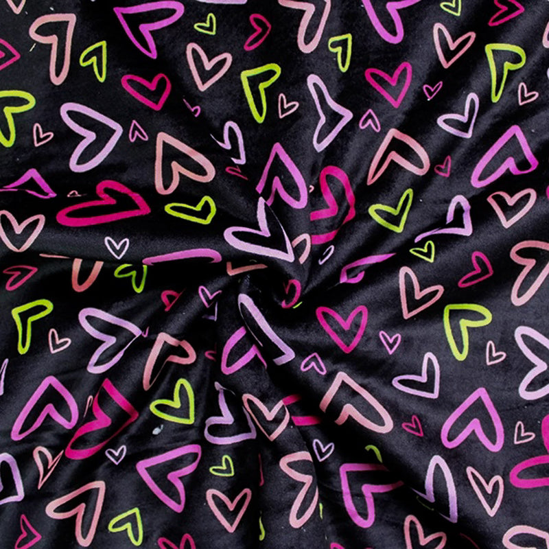 Black fleece with colourful hearts back with a white sherpa fleece in a swirl