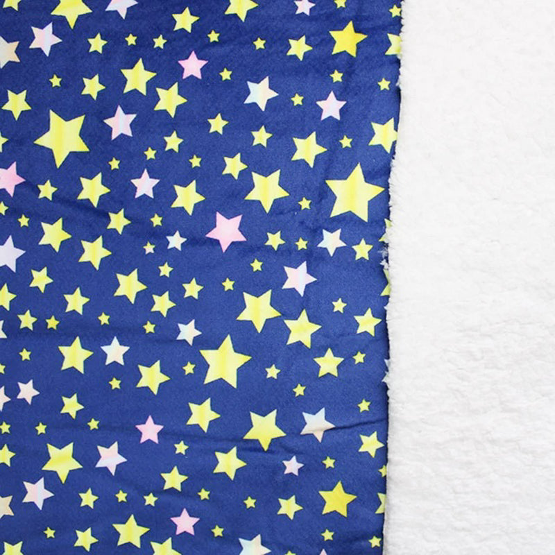 Bubs sherpa fleece printed with stars on blue back and front